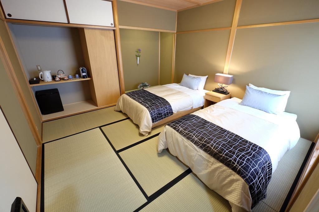 Hotel Miyagawacho Yoshii Kioto Habitación foto